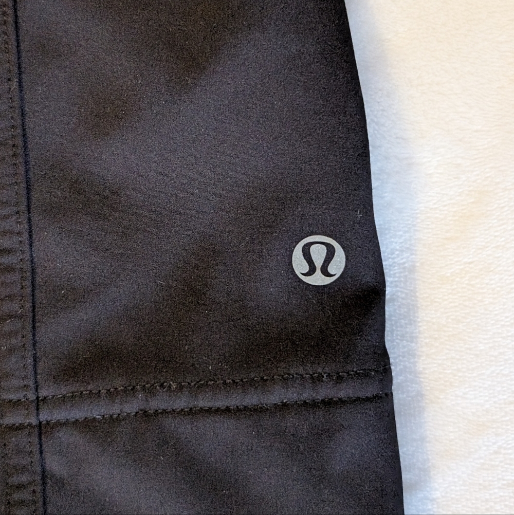 Lululemon Apres Yoga black soft shell hooded rain jacket